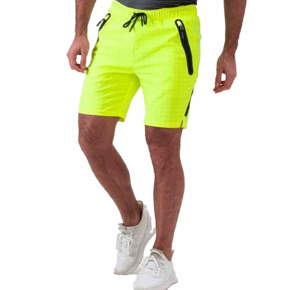 Sjeng Sports Yvor tennisshort heren acid yellow